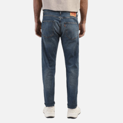 512 BLUE SLIM TAPERED JEANS