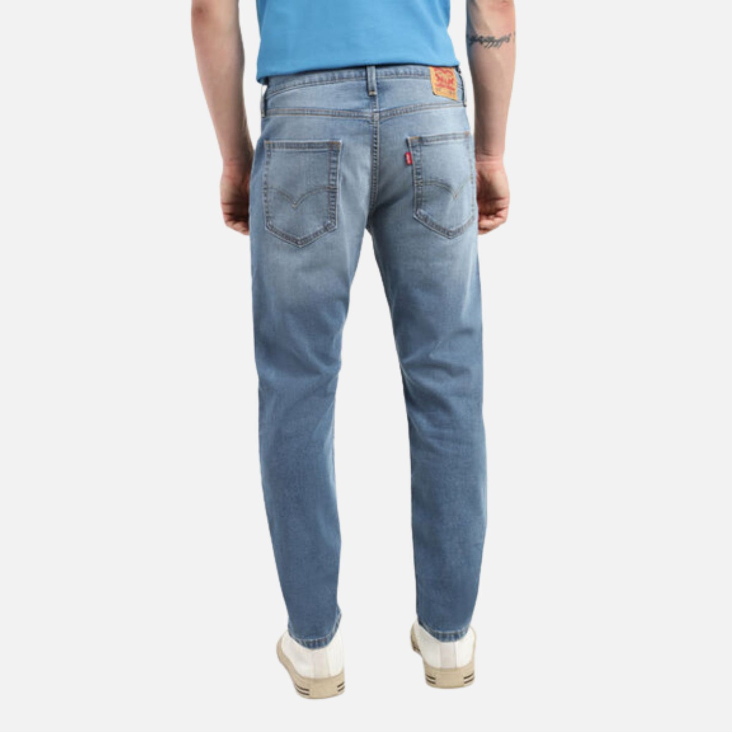 512 MID INDIGO SLIM TAPERED FIT JEANS