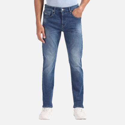 Mid Rise Slash Slim Tapered Jeans