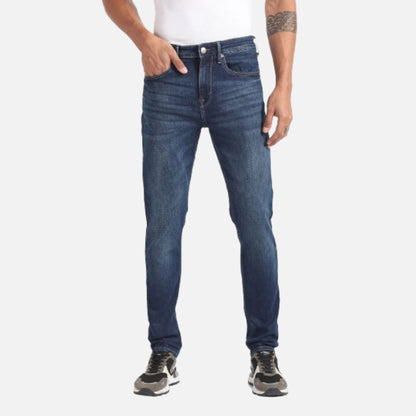 Mid Rise Slash Slim Tapered Jeans