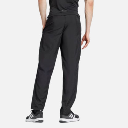 TRAIN ESSENTIALS SEASONAL WOVEN TRAINING PANTS