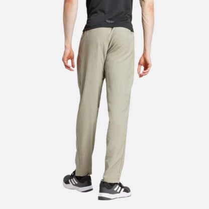 TRAIN ESSENTIALS SEASONAL WOVEN TRAINING PANTS