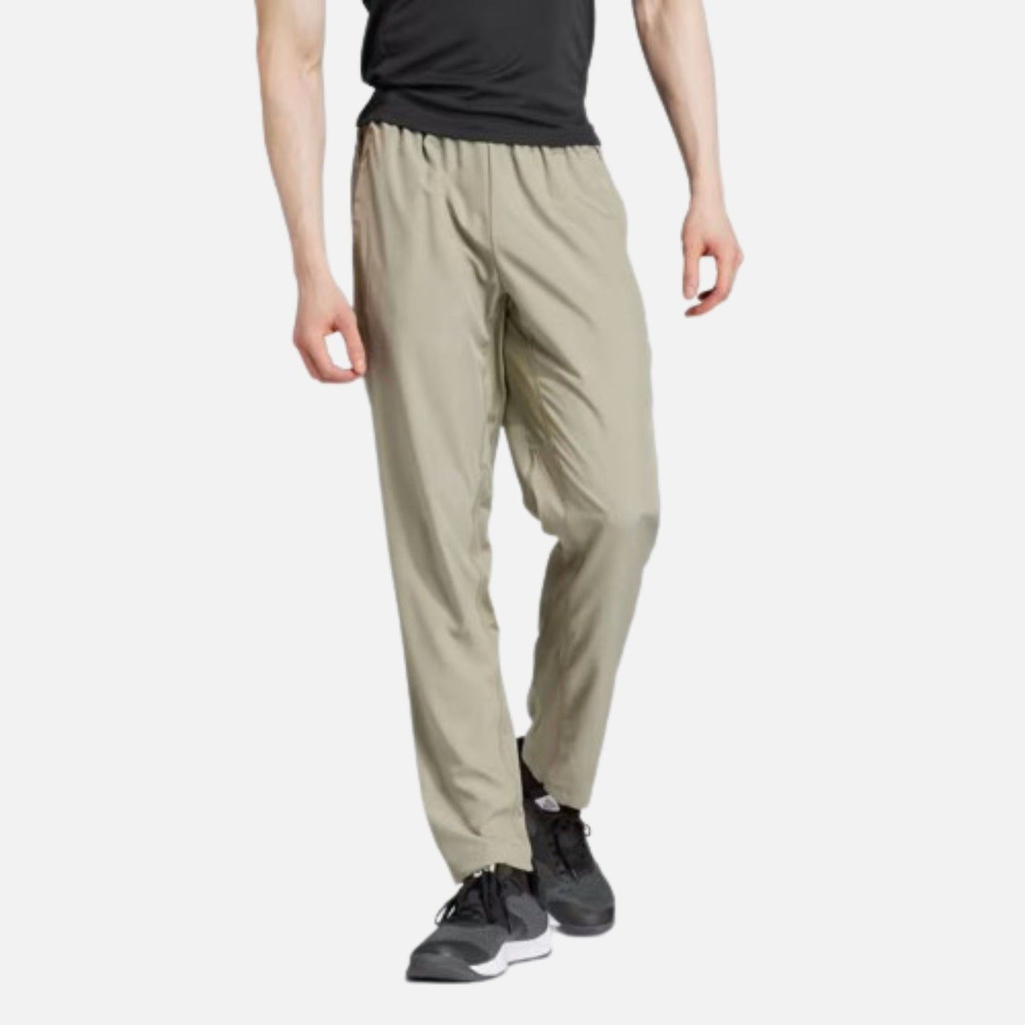 TRAIN ESSENTIALS SEASONAL WOVEN TRAINING PANTS