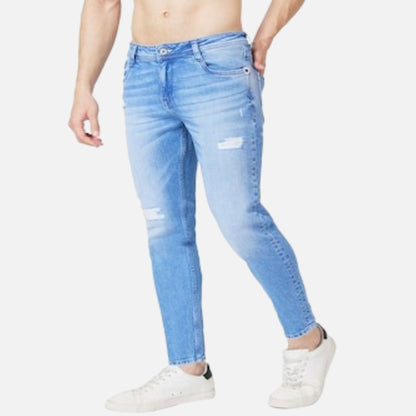 LIGHT BLUE COTTON SLIM FIT TAPERED LENGTH MILD DISTRESSED MID RISE JEANS